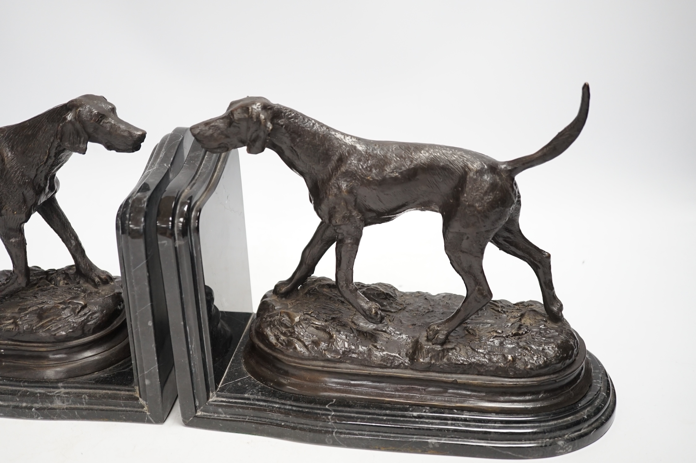 After Pierre-Jules Mêne (1810-1879), a pair of bronze models of hunting hounds